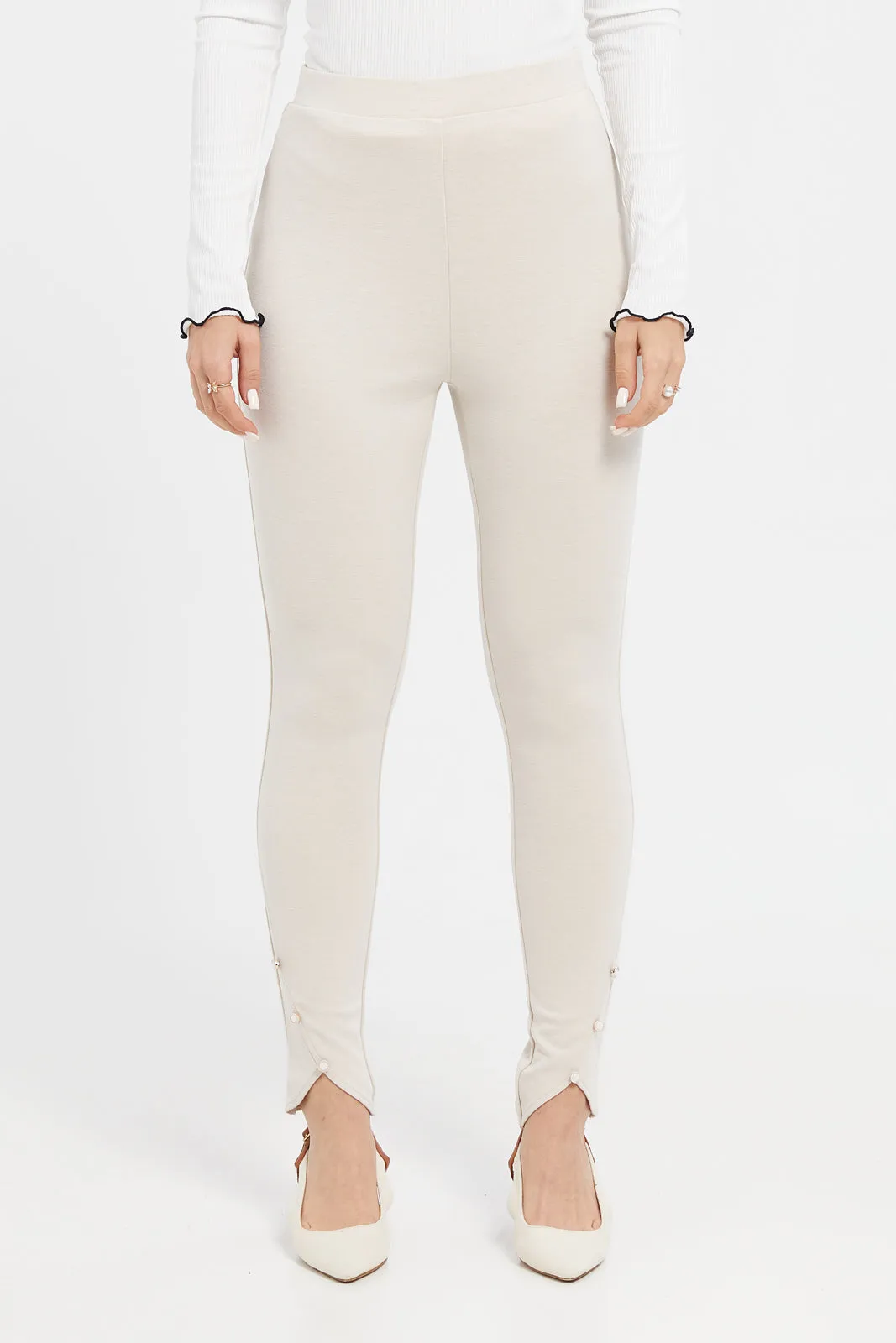 Women Ivory Multi Button Leggings
