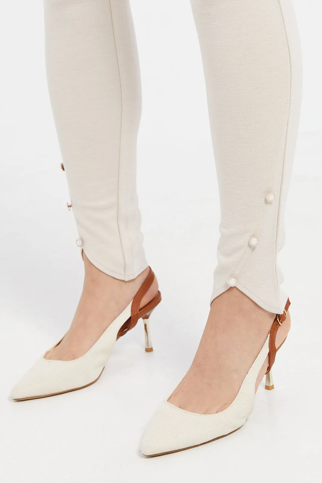 Women Ivory Multi Button Leggings